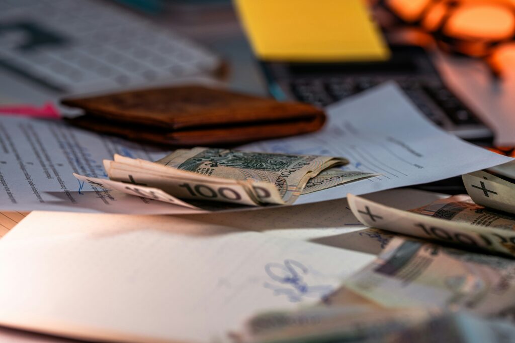 Money quietly leaking from a bank account through hidden monthly costs