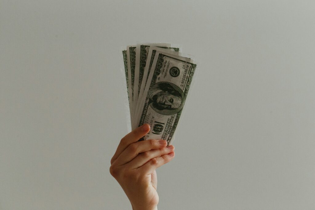 Person exploring realistic ways to make money from home.