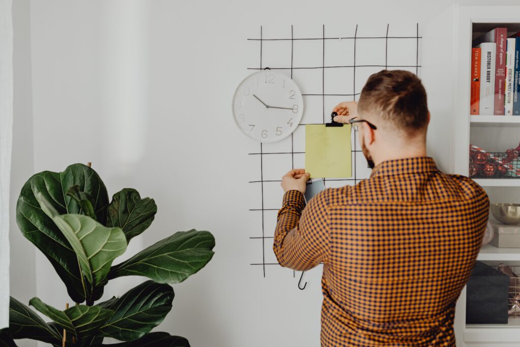 Person setting up simple systems to organize their life in one week.