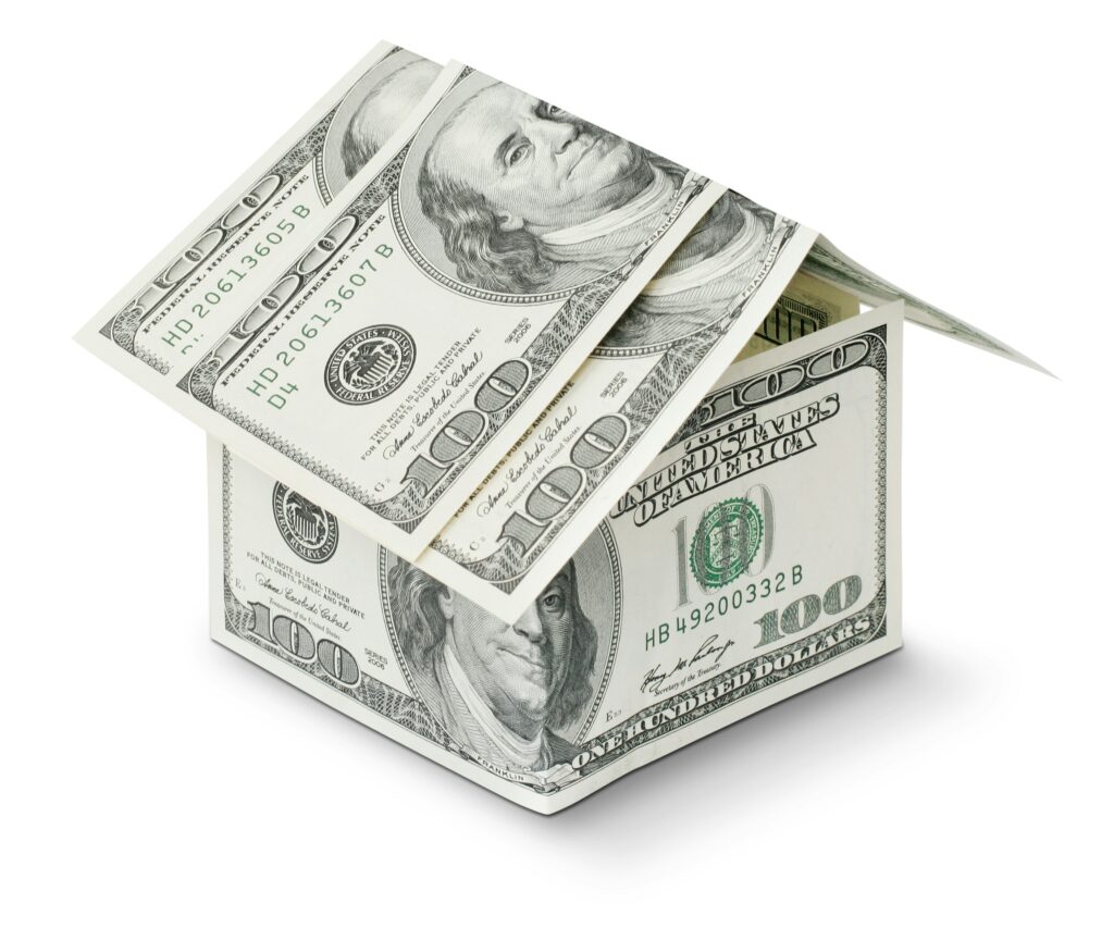 Person practicing small money habits to build wealth over time
